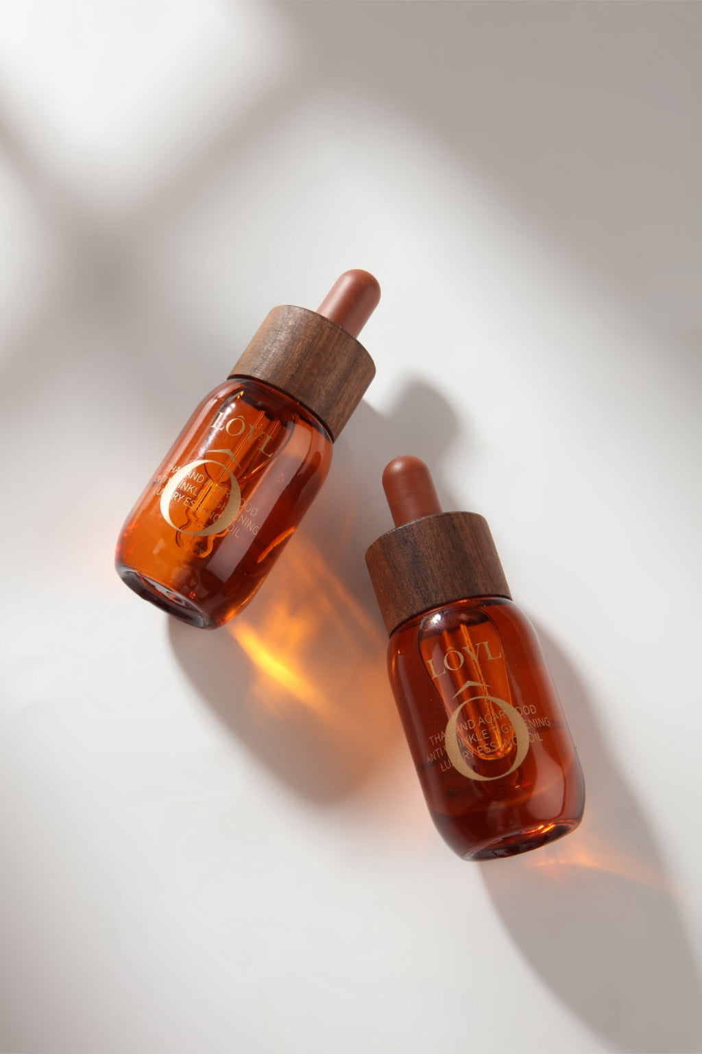 THAILAND AGARWOOD ANTI WRINKLE TIGHTENING LUXURY ESSENCE OIL